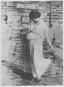 Isadora Duncan posing at the Temple of Dionysus