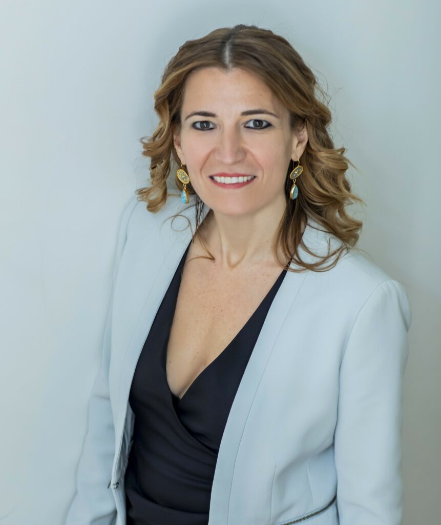 Professional headshot of Nina